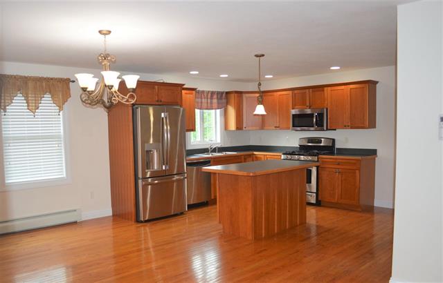 NEW PRICE! Townhouse with views of the Cocheco River. Located near St Elizabeth Seton School