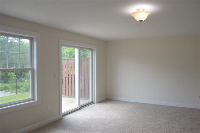 NEW PRICE! Townhouse with views of the Cocheco River. Located near St Elizabeth Seton School
