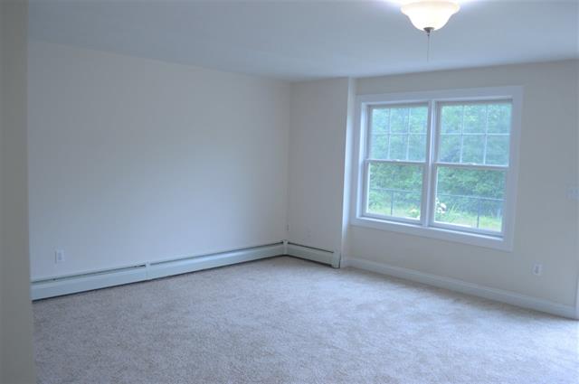 NEW PRICE! Townhouse with views of the Cocheco River. Located near St Elizabeth Seton School
