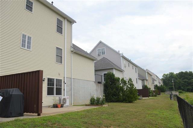 NEW PRICE! Townhouse with views of the Cocheco River. Located near St Elizabeth Seton School
