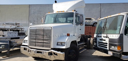 1987 FREIGHTLINER FLC ROLL OFF TRUCK