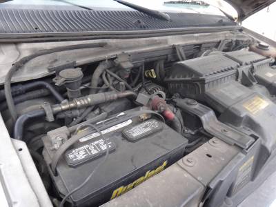 2002 ford e350 diesel battery location