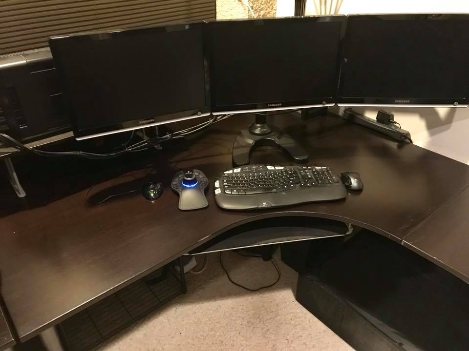 IKEA Galant Corner Desk in Black/Brown finish. Includes keyboard rest & book shelf.
