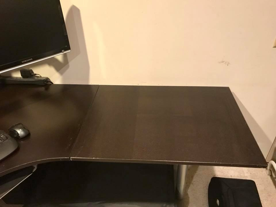 IKEA Galant Corner Desk in Black/Brown finish. Includes keyboard rest & book shelf.
