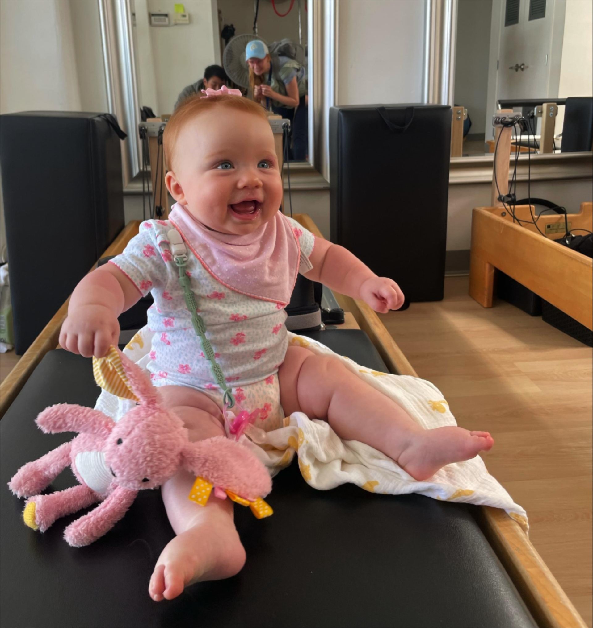 a baby sitting on a chair