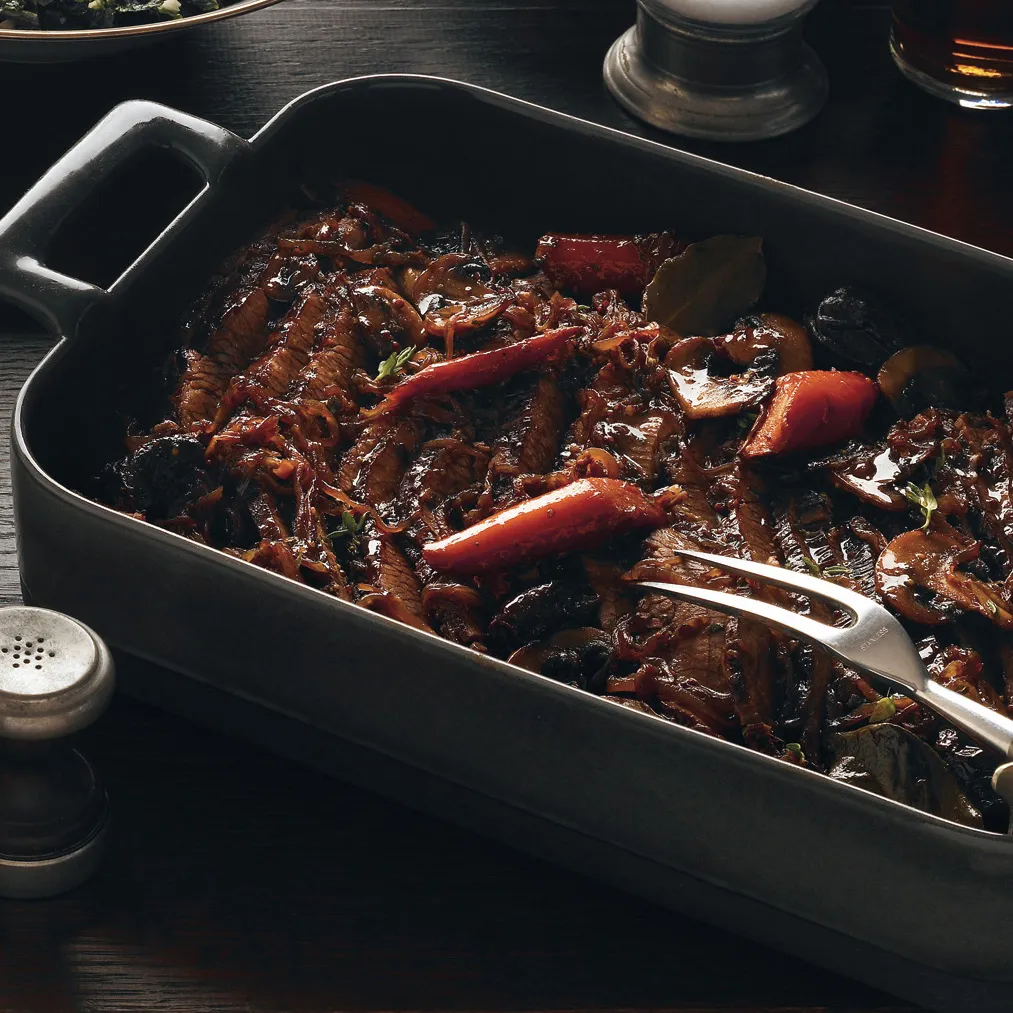 a dish with meat and vegetables in it