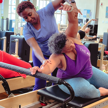a woman stretching her arm