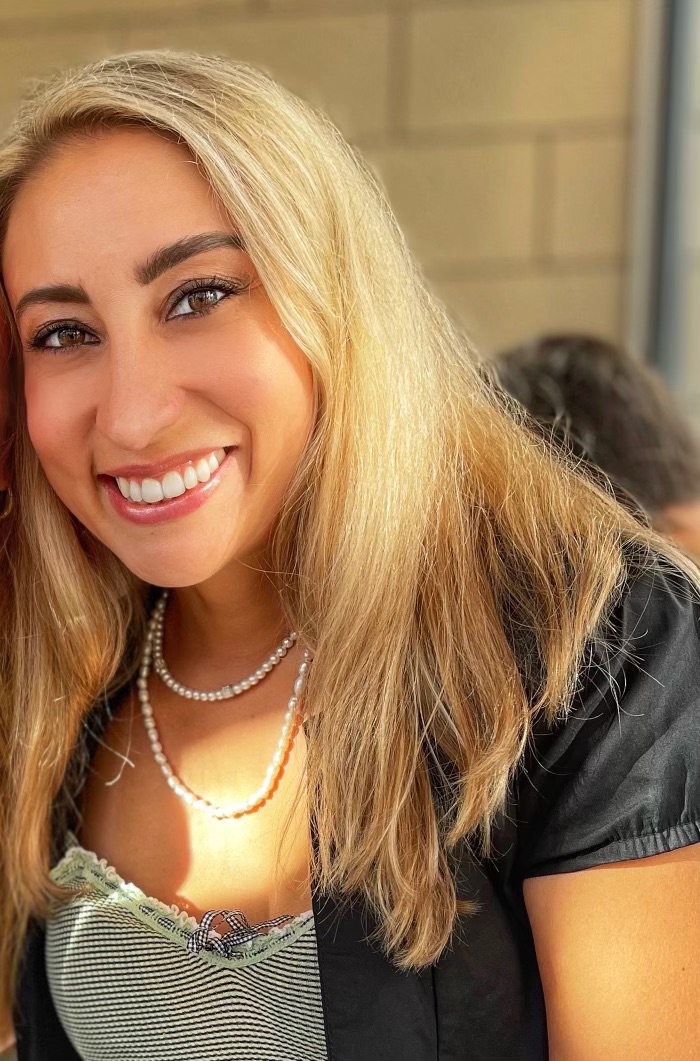 a woman standing on a bar
