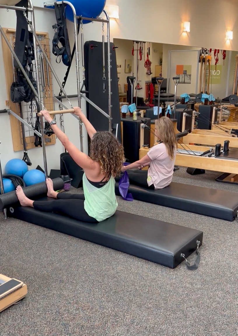 a group of women working out in a gym