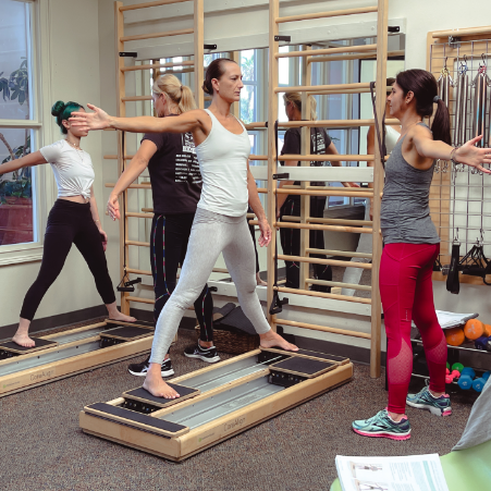 a group of women in a gym