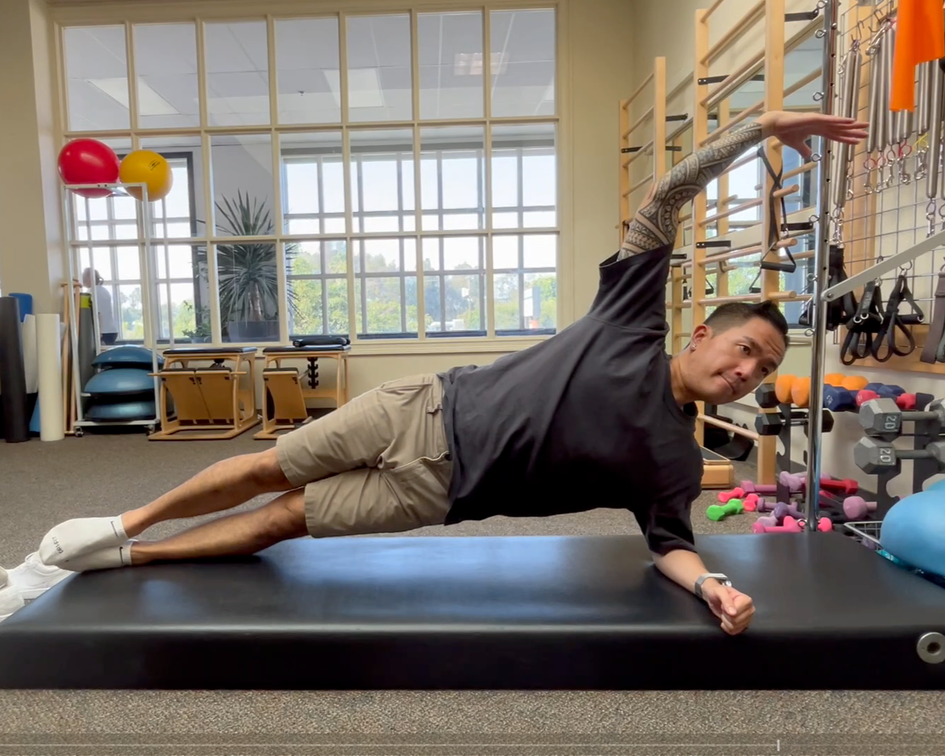 a man doing a plank on a bench