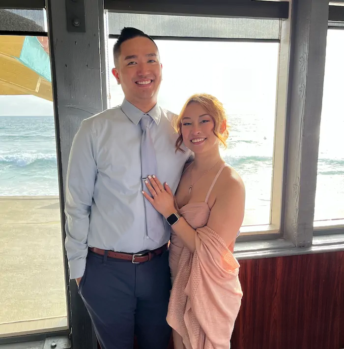 a man squatting in a room