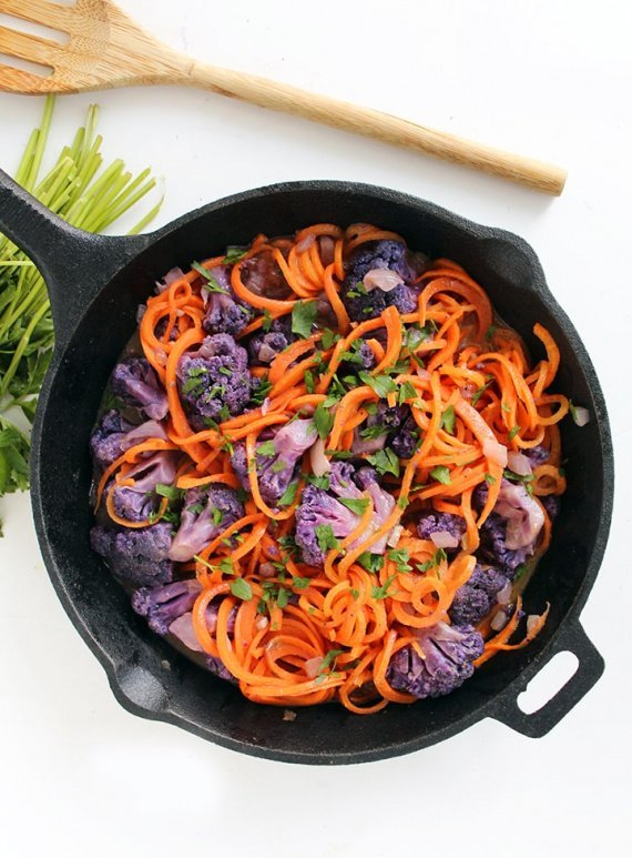 a pan of food with vegetables