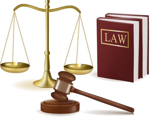 Three icons of the law. A set of golden scales, two law books, and a gavel resting on a wooden base.