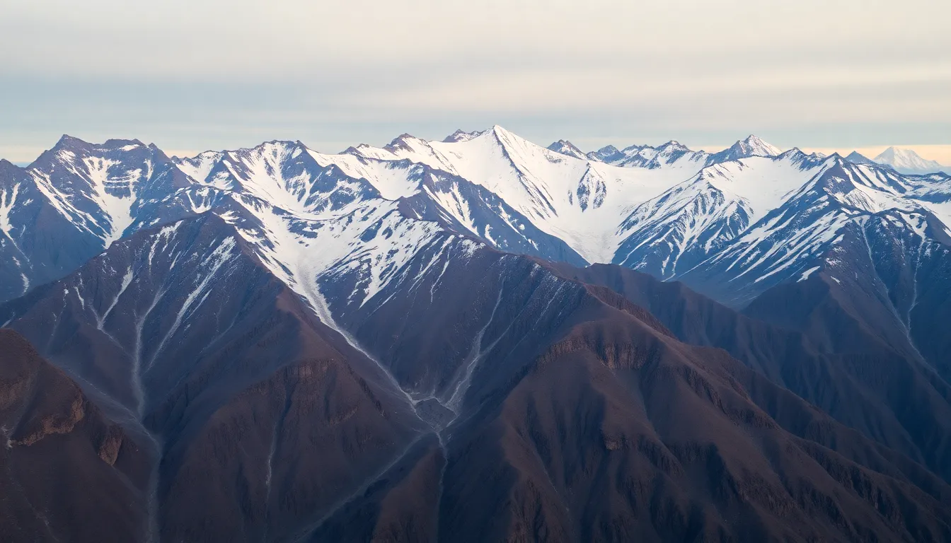 Dawn Over Rugged Snow-Capped Mountains