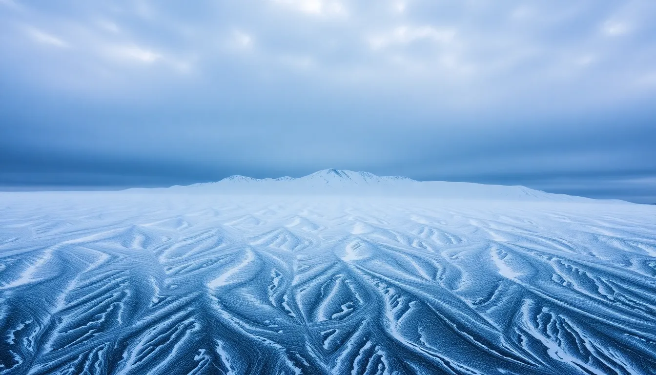 Dramatic Snow-Capped Mountains Under Cloudy Sky