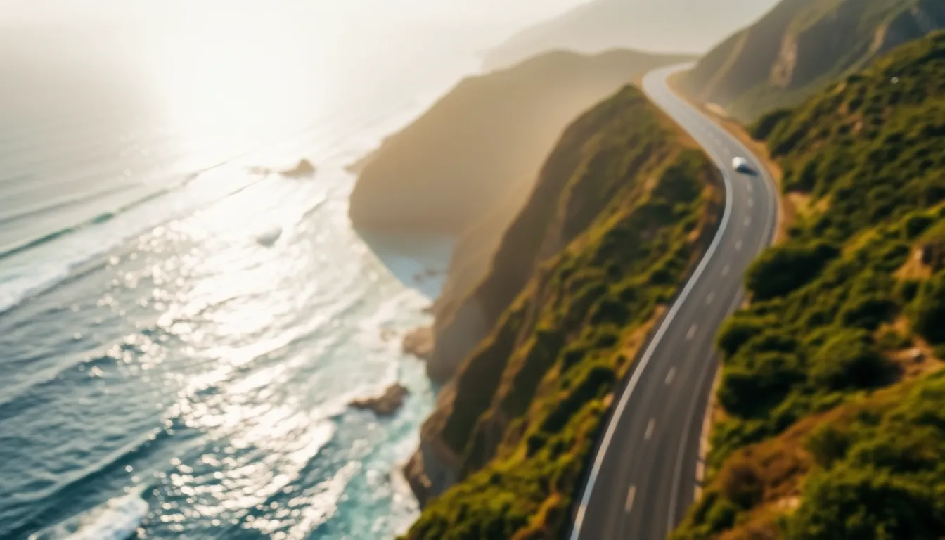 This stunning aerial photo captures a winding coastal highway that hugs the cliffs overlooking the sea, bathed in soft morning light. The selective focus draws attention to the road, inviting viewers to imagine a journey along this picturesque route. Vibrant blues of the ocean and greens of the vegetation contrast beautifully, depicting nature's serenity. The leading lines formed by the highway enhance the overall sense of depth and movement in this scenic landscape.