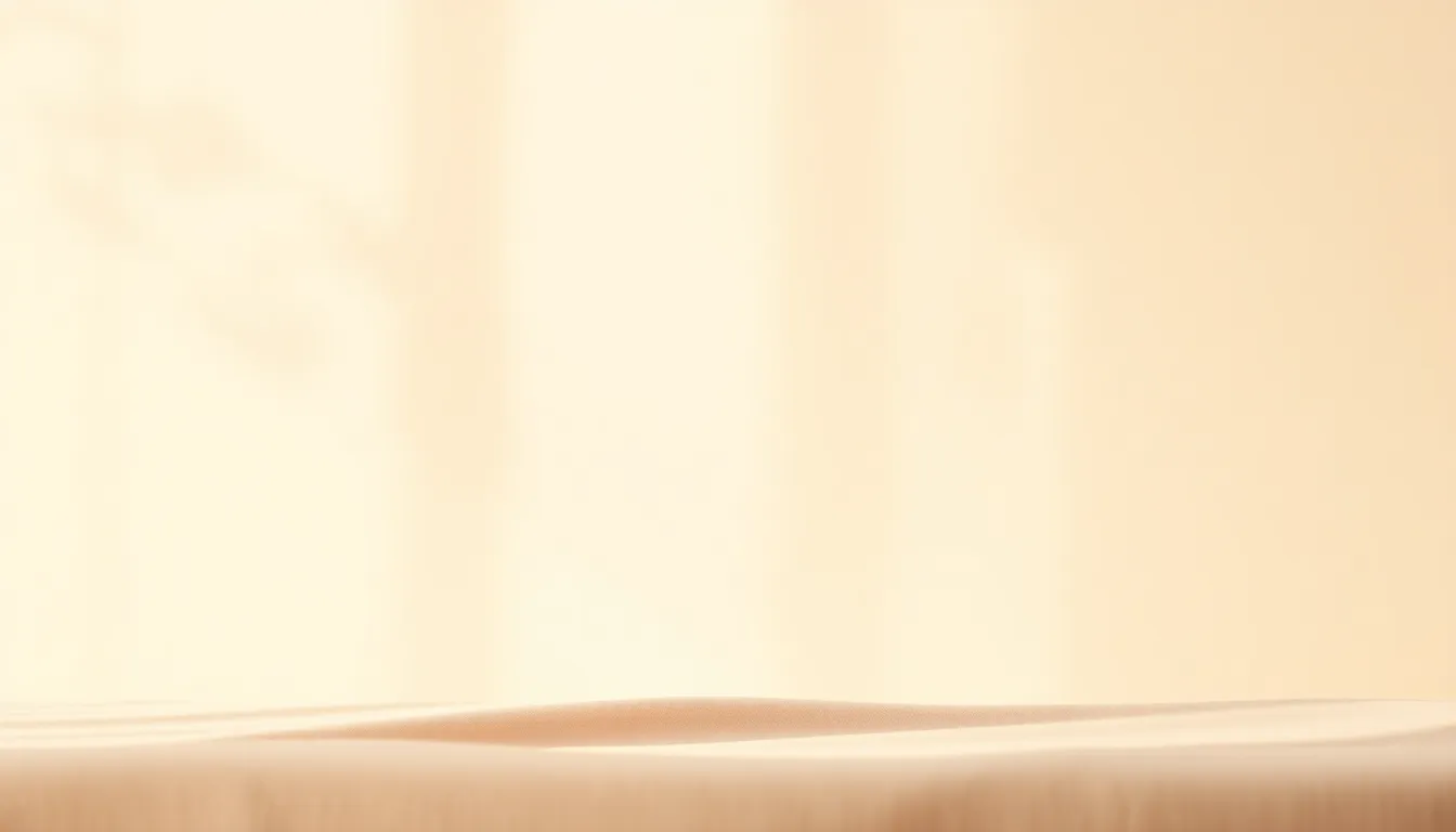 This image presents a serene minimalist abstract background with soft pastel hues. Natural light gracefully filters through a window, creating gentle shadows that enhance the delicate colors. The harmonious blending of pinks, blues, and yellows evokes a sense of calm and tranquility. The composition nicely balances visual elements while the subtle texture of the cloth adds depth and interest, making it ideal for various creative applications.