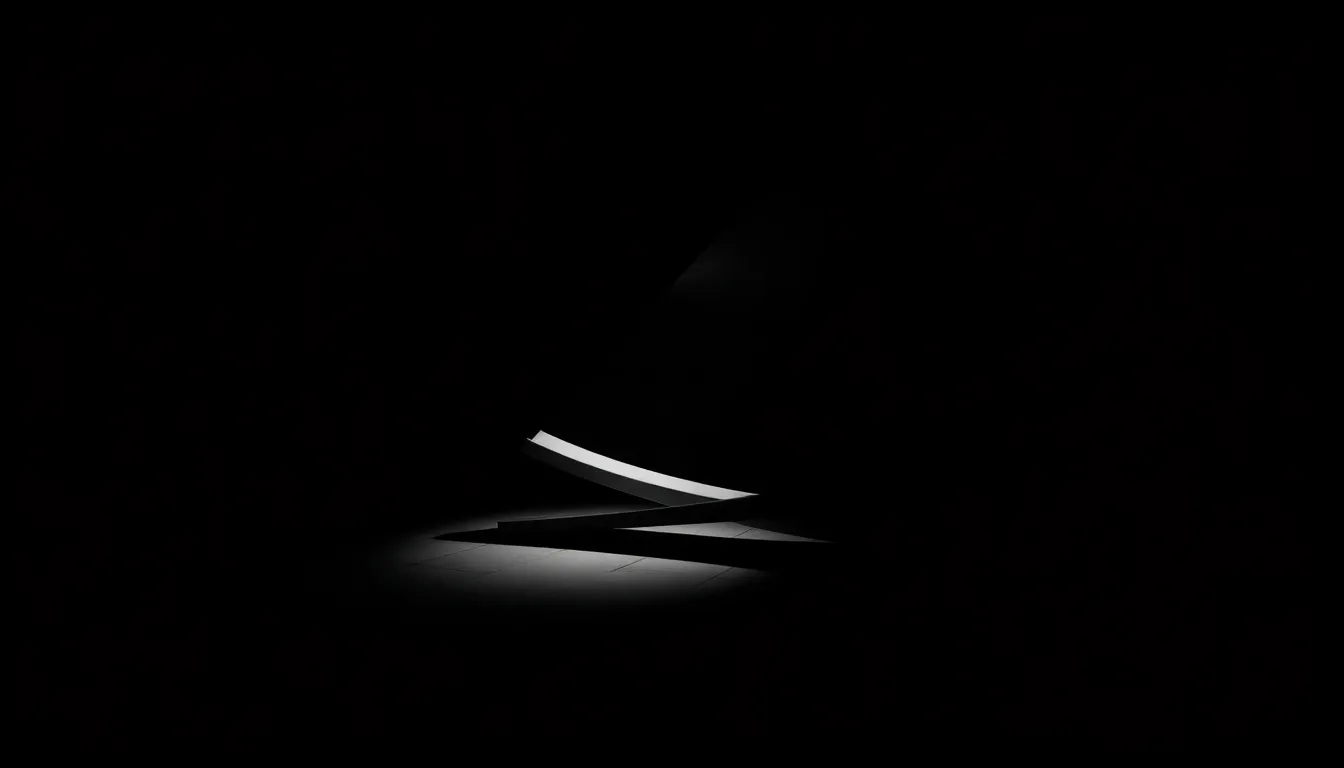 A dramatic monochrome abstract background characterized by strong contrasts achieved through chiaroscuro lighting. The central arrangement of lines and curves creates a sense of movement and tension, while the deep blacks and brilliant whites enhance the visual impact. The smooth textures echo polished stone, adding depth and elegance to the piece. This powerful background is perfect for conveying intensity in digital projects.
