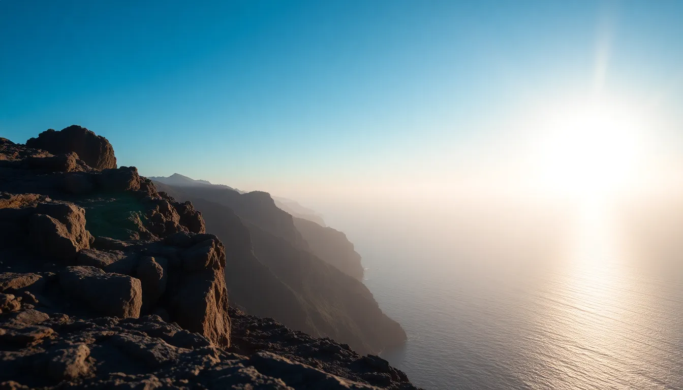 This breathtaking aerial image showcases a dramatic cliffside at sunrise, where soft, low-angled light accentuates the jagged rock formations. The composition employs a diagonal line to draw the viewer’s eye, while the shallow depth of field isolates the textures of the cliff against a beautifully blurred ocean background. A soothing palette of cool blues and greys is warmed by golden sunlight, creating a surreal and captivating atmosphere that transports the viewer to this stunning coastal scene.