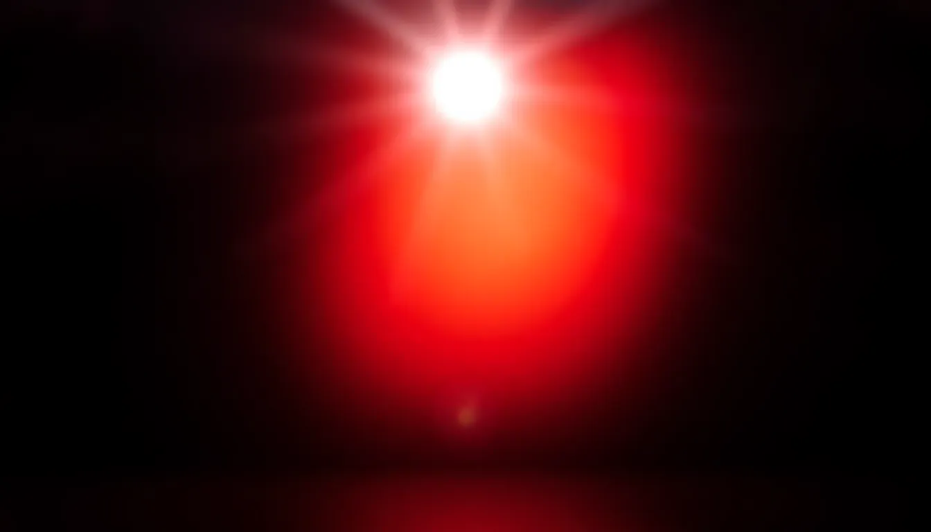 Featuring a vibrant gradient that swirls from fiery red to deep orange, this image captures a dramatic interplay of light and color. A single spotlight casts bold contrasts against a dark background, emphasizing the gradient's energy. The shallow depth of field creates a dreamy bokeh effect, while leading lines in the composition draw the viewer's gaze towards the vivid colors, presenting an almost liquid-like texture.