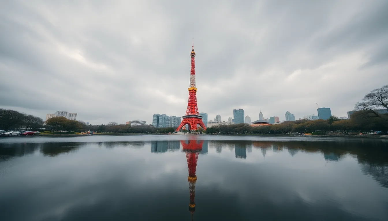 In this captivating photograph, Tokyo Tower is perfectly mirrored in a tranquil pond under an overcast sky. The muted color palette harmonizes the scene, while the calm water surface emphasizes the symmetrical beauty of the tower and its surroundings. Sharp focus across the entire frame invites viewers to explore the city skyline beyond, creating a serene yet urban atmosphere.