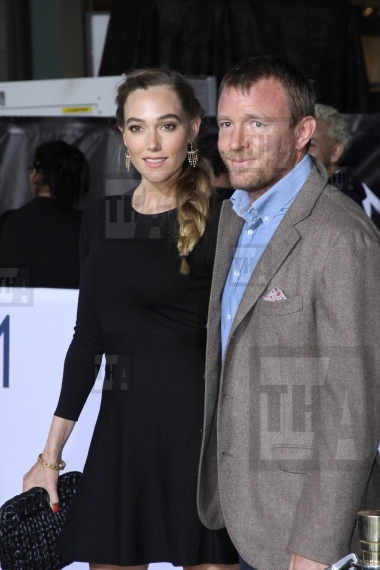 Guy Ritchie (r) and guest