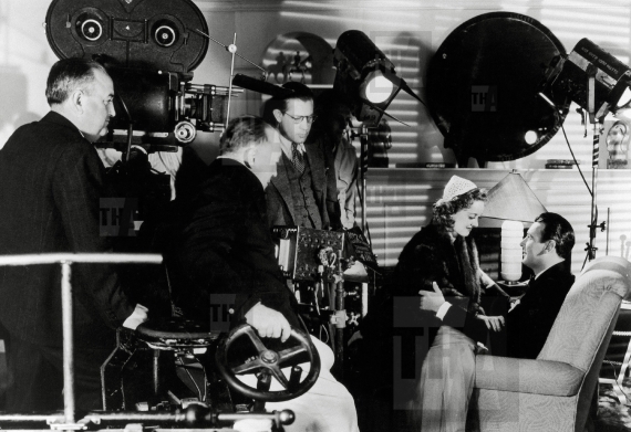 Director Edmund Goulding, Bette Davis, George Brent