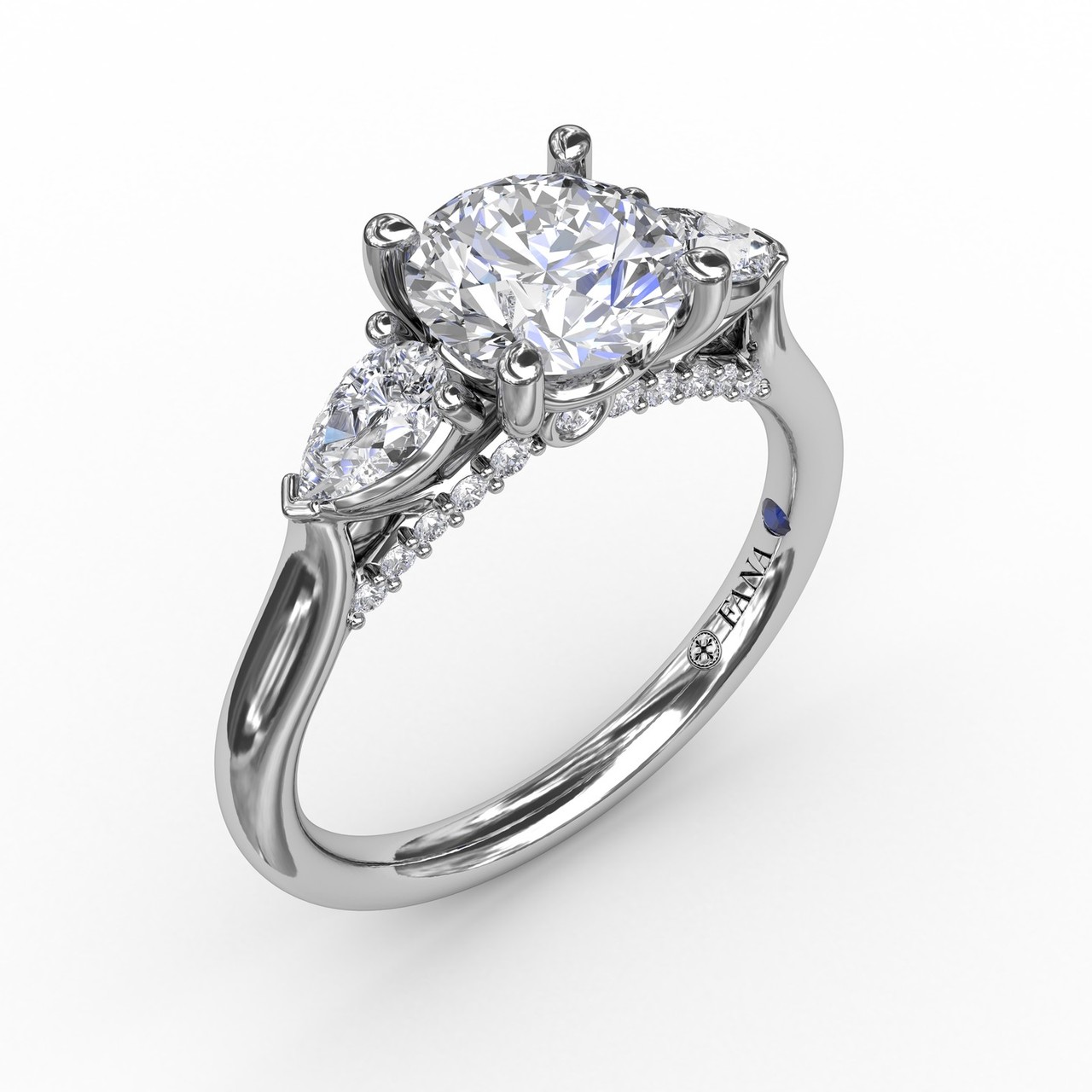 Classic Three-Stone Diamond Engagement Ring With Pear-Shape Side Diamonds